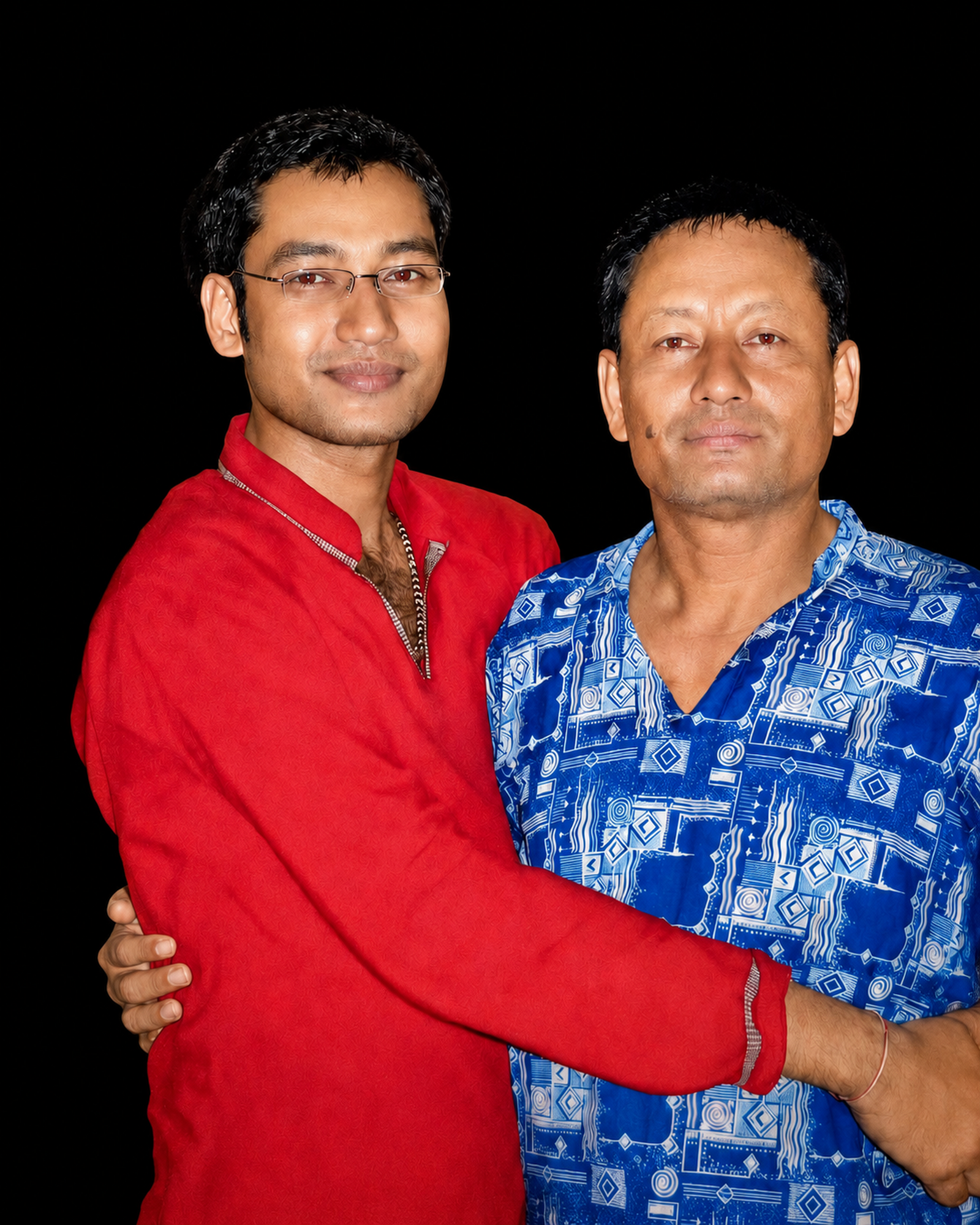 Regan Barua embracing his father